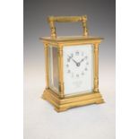 Late 19th/early 20th Century gilt brass carriage clock, cream Arabic dial inscribed Goldsmiths