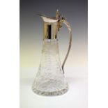 Cut glass claret jug, having etched floral decoration with silver-plated mount and handle, 28cm high