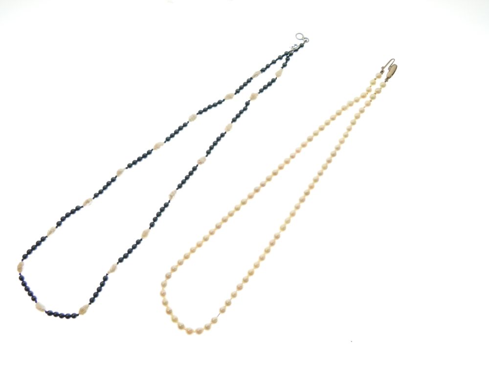 Cultured pearl necklace with yellow metal clasp stamped 9ct, 39cm long, together with a pearl and - Image 2 of 4