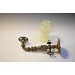Victorian wall mounted cast metal light fitting with vaseline glass frill edged shade