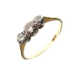 Yellow metal and three stone diamond ring, shank stamped 18ct, size J½, 1.8g gross approx