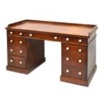 Victorian mahogany twin pedestal desk fitted nine drawers having turned ivory handles, 138cm wide