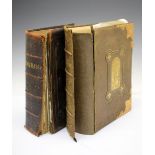 Books - Two large leather bound Bibles
