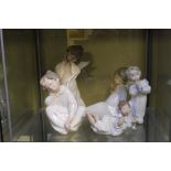 Four Lladro porcelain figures of child angels, tallest 22cm high
