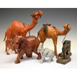 Collection of animal figurines to include; two camels, two elephants, etc, largest 38cm high