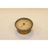 Early 20th Century brass aneroid barometer in bulk head-style case, 12cm diameter