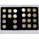 Two trays of replica Foreign 'coins'