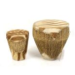Two African zebra skin drums, 46cm and 28cm diameter