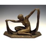 French Art Deco style bronze finish plaster figure bearing signature for Colinet, 38cm high