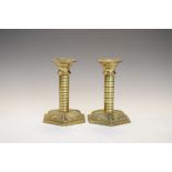 Pair of brass candlesticks with hexagonal bases, 12.5cm high