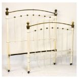 Victorian-style brass and cream painted double bed ends, the head 149cm high