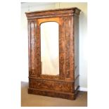 Victorian figured walnut wardrobe with central mirrored door and drawer below, 136cm wide