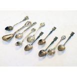 Assorted silver and white metal souvenir spoons