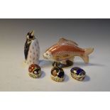 Five Royal Crown Derby paperweights to include penguin, Millennium Bug, fish etc, the tallest 13cm