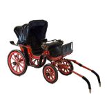 Late Victorian or Edwardian dog-cart, with deep-buttoned black leather seat and straw-filled squab