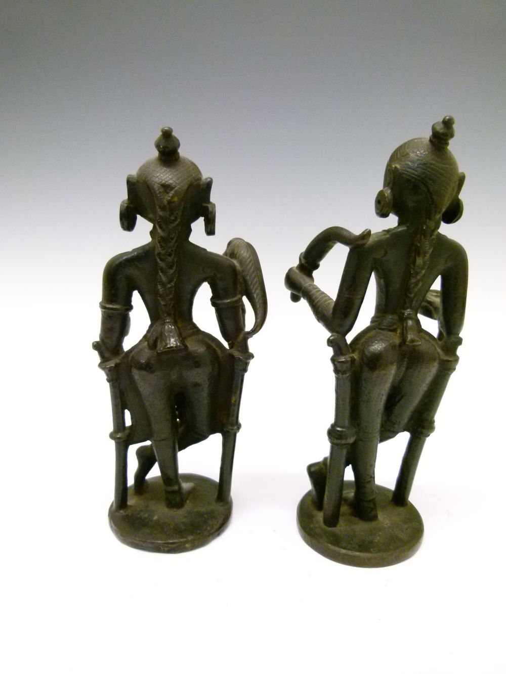 Pair of 18th or 19th Century Indian bronze figures, each modelled as an attendant with top-knot - Image 4 of 7