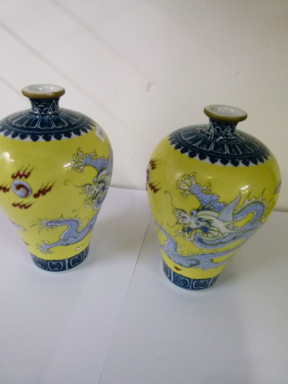 Pair of Chinese porcelain yellow ground Meiping vases, each finely decorated in shallow relief - Image 6 of 7