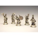 Set of five Spanish white metal bandsman figures, each standing on an integral plinth, weighted,