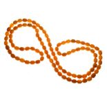 Amber bead necklace, composed of ninety-six beads, 143g gross Condition: The yellow coloured beads