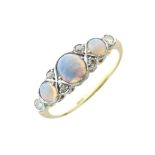 Opal and diamond ring, stamped '18ct', the three graduated round cabochons with single cut
