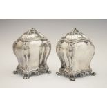 Pair of early George III silver tea caddies, of bombe form on four scroll feet with domed covers,