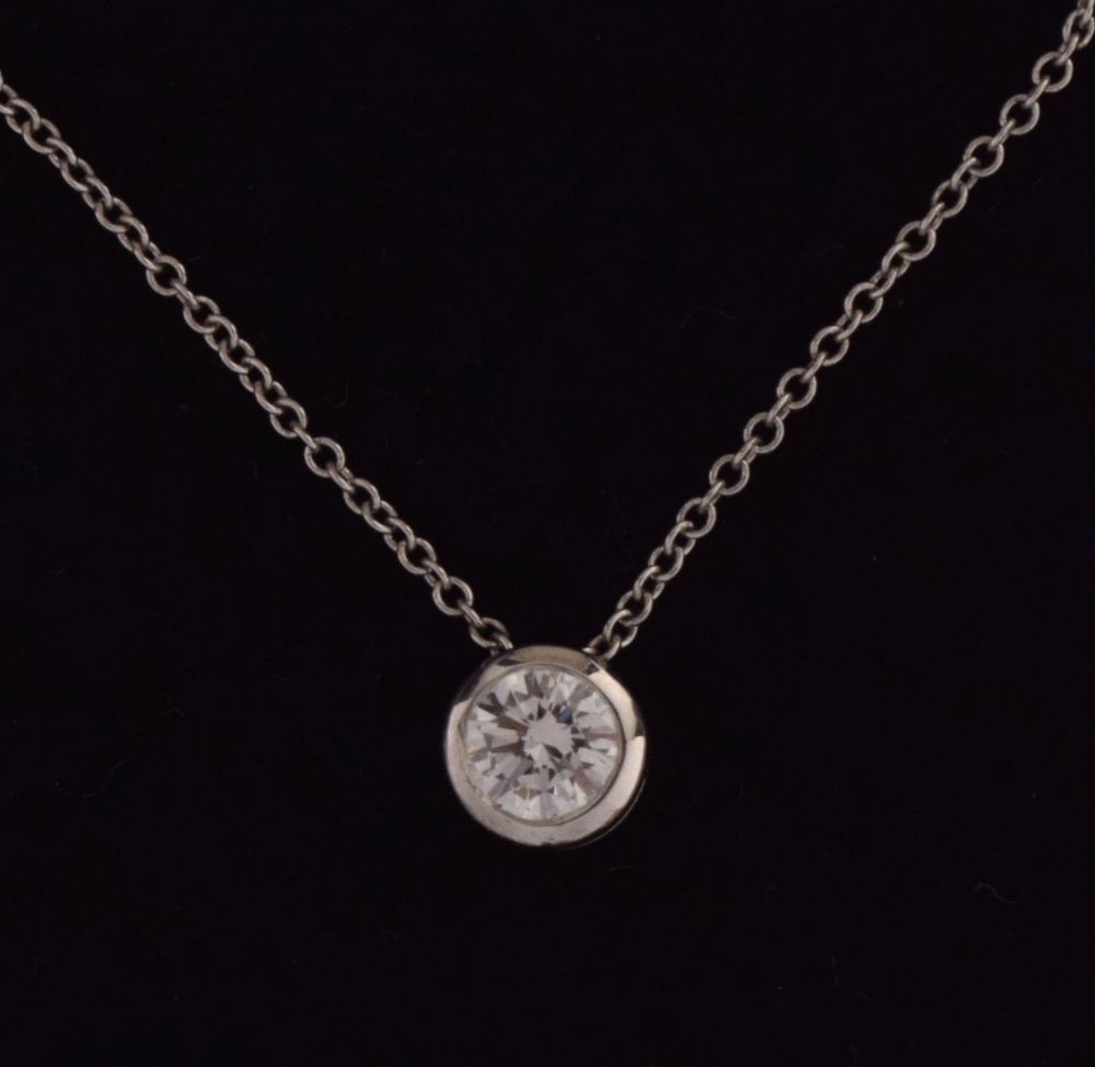 Single stone diamond pendant, in 18ct white gold, the brilliant cut approximately 0.3 carats