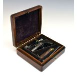 Boxed late 18th Century flintlock pocket pistol with turn-off barrel, box lock action, safety catch,