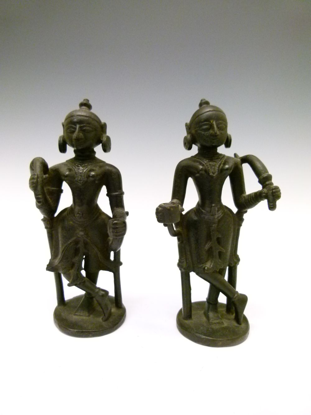 Pair of 18th or 19th Century Indian bronze figures, each modelled as an attendant with top-knot - Image 2 of 7