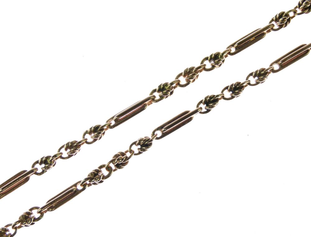 9 carat rose gold chain, the links in the style of an old watch albert, 57.5cm long, 42g gross,