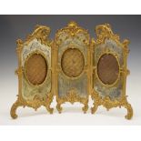 Late 19th or early 20th Century cast gilt metal triptych photograph frame in the manner of Palais