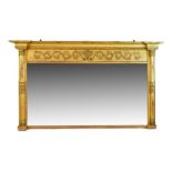 Early 19th Century gilt overmantel mirror, of inverted breakfront design with cavetto-moulded