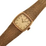Omega De Ville - Lady's 9ct gold mechanical bracelet watch, the cushion shaped signed gilt dial with
