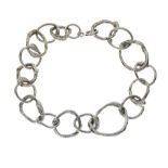 Jane Watling silver 'fused' bracelet, of randomly sized mis-shapen links, London 1990, 20cm long