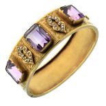 Late 19th Century hinged bangle, unmarked gold, the three rectangular cut stones with seed pearl set