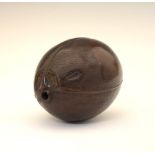 Carved coconut 'Bugbear' flask, with typical comical face, lacking stopper, 12cm long Condition: