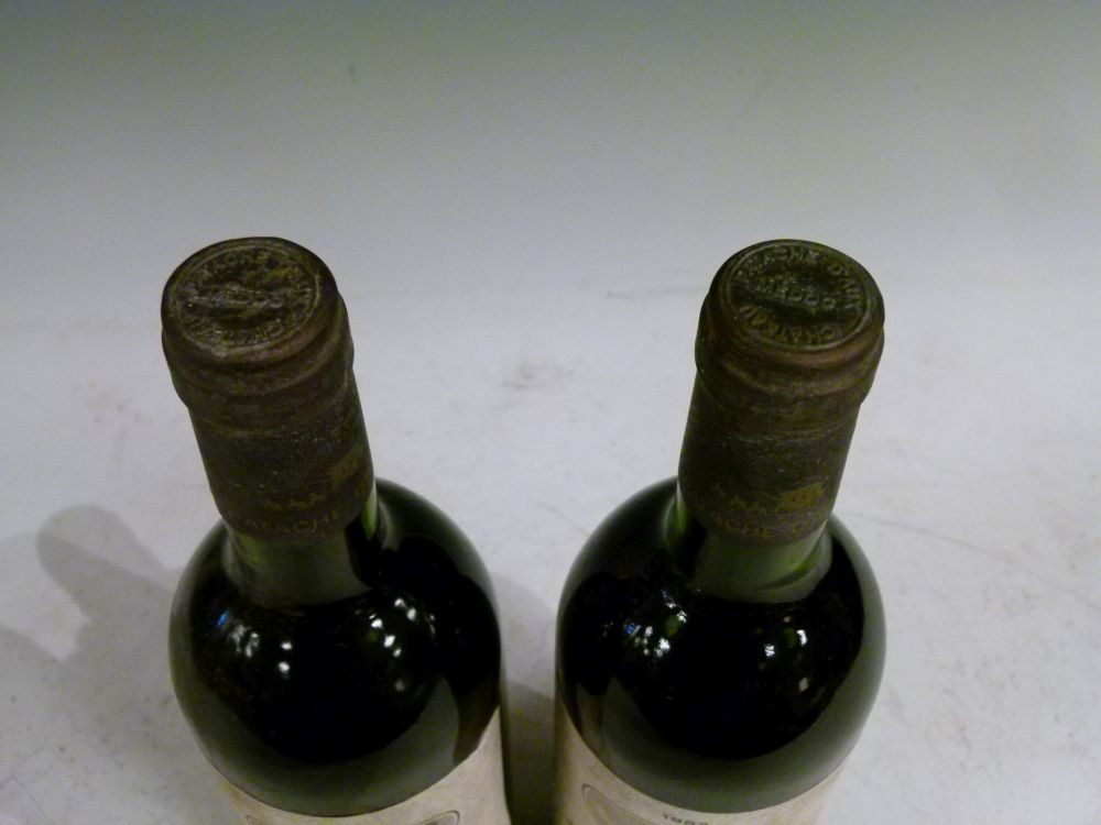 Wines & Spirits - Two bottles of Chateau Patache d'Aux, Medoc 1982 (2) Condition: Levels and seal - Image 2 of 4