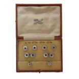 Cased gentleman's dress set, stamped '18ct', the cufflinks, four dress button and two collar studs