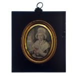 Late 18th/early 19th Century portrait on ivory - Lady in a bonnet, sat beside a window holding a