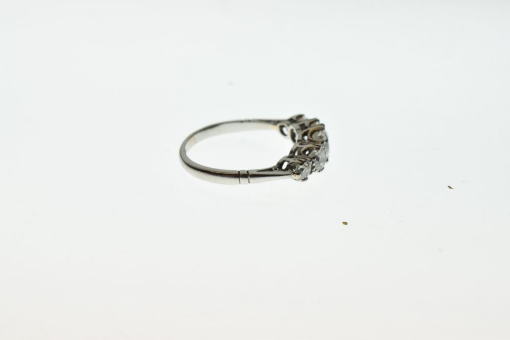 Five stone diamond ring, stamped 'Plat', the graduated old brilliant cuts totalling approximately - Image 3 of 6