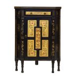 Victorian Aesthetic Movement floor-standing corner cabinet, with frieze drawer over panelled