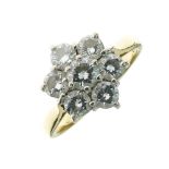 Seven stone diamond 18ct gold cluster ring, the modern brilliant cuts totalling approximately 1.1