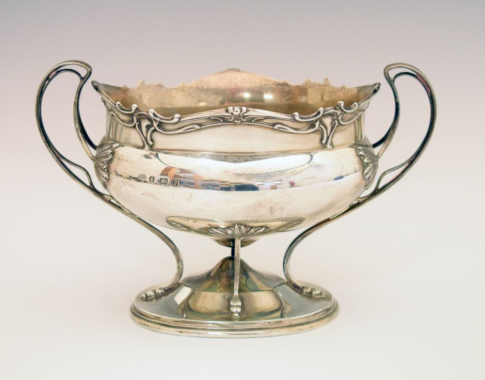 George V Art Nouveau silver bowl on stand, having naturalistic decoration with twin stylised handles