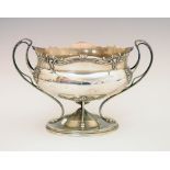 George V Art Nouveau silver bowl on stand, having naturalistic decoration with twin stylised handles
