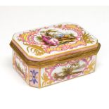 Early 20th Century German porcelain box, of canted oblong form with hinged cover decorated with a