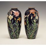 Pair of early 20th Century Japanese cloisonné vases, each of slender ovoid form decorated with