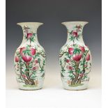 Large pair of Chinese Canton Famille Rose porcelain vases, each of ovoid form with waisted neck,