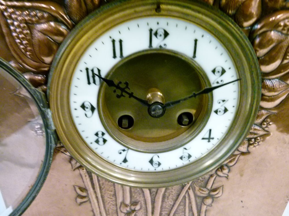 Arts & Crafts/Art Nouveau copper mantel clock, with humped overhanging roof above repousse flowering - Image 3 of 10