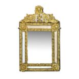 Flemish-style gilt sheet metal wall mirror, with bevelled rectangular central plate within four