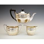 George V three-piece tea set, of shaped rectangular form with beaded border, sponsors mark