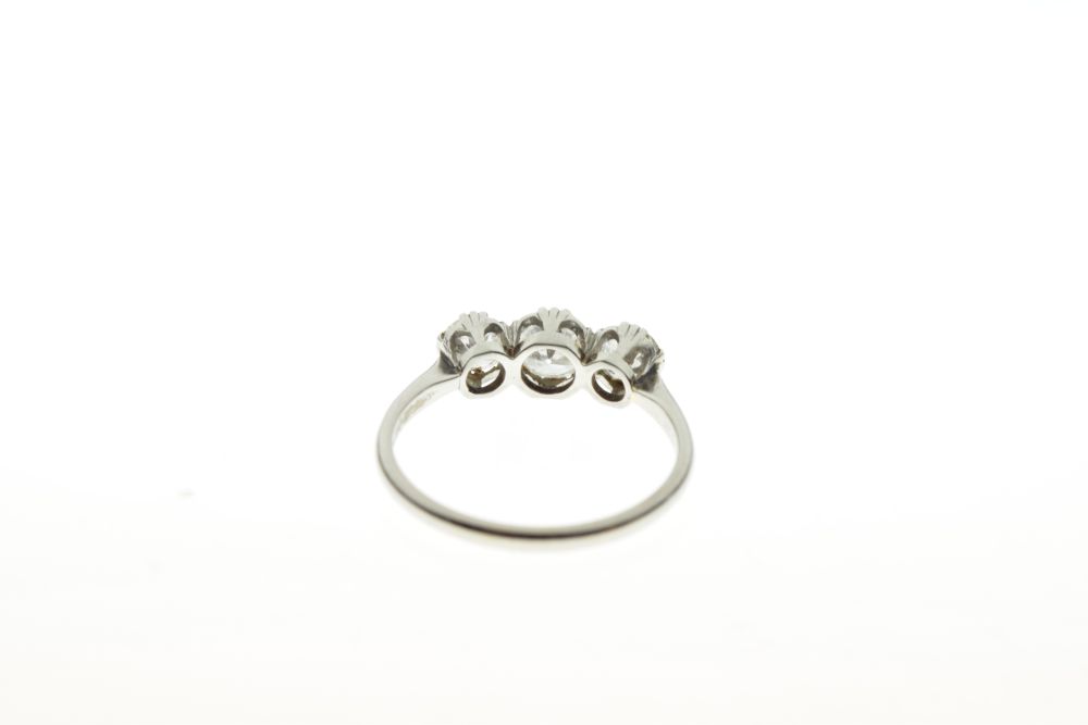 Three stone diamond ring, the white mount stamped 'Plat 18ct', the graduated brilliant cuts of - Image 3 of 6